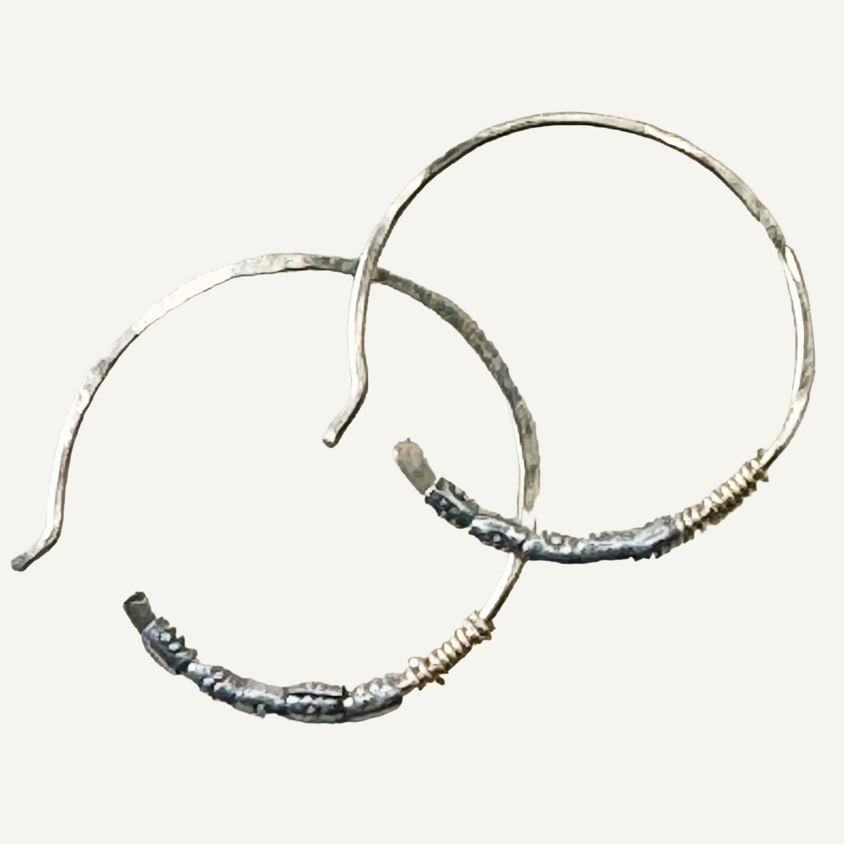 Forged golden hoop earrings with Hill Tribe silver