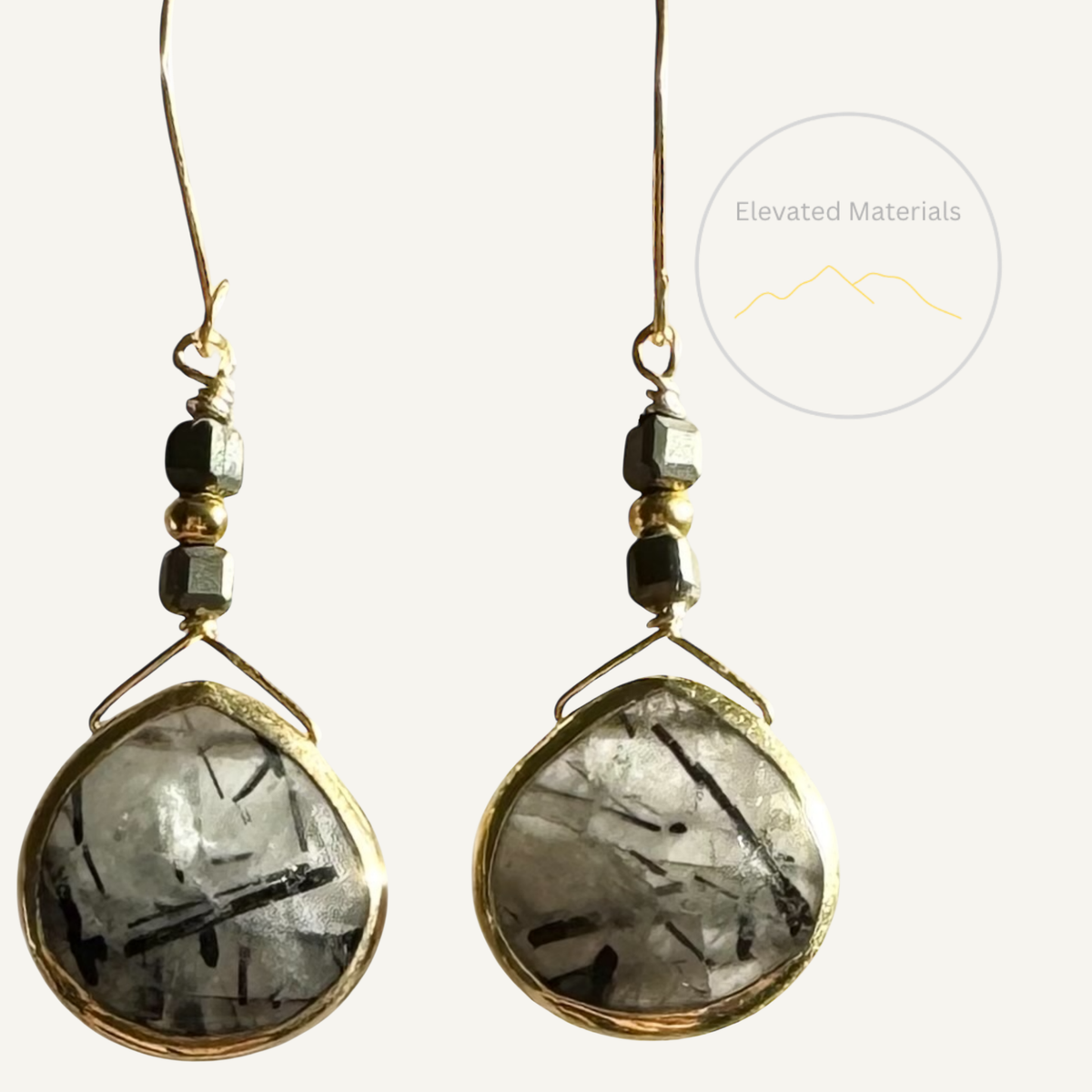 Rutilated quartz golden earrings