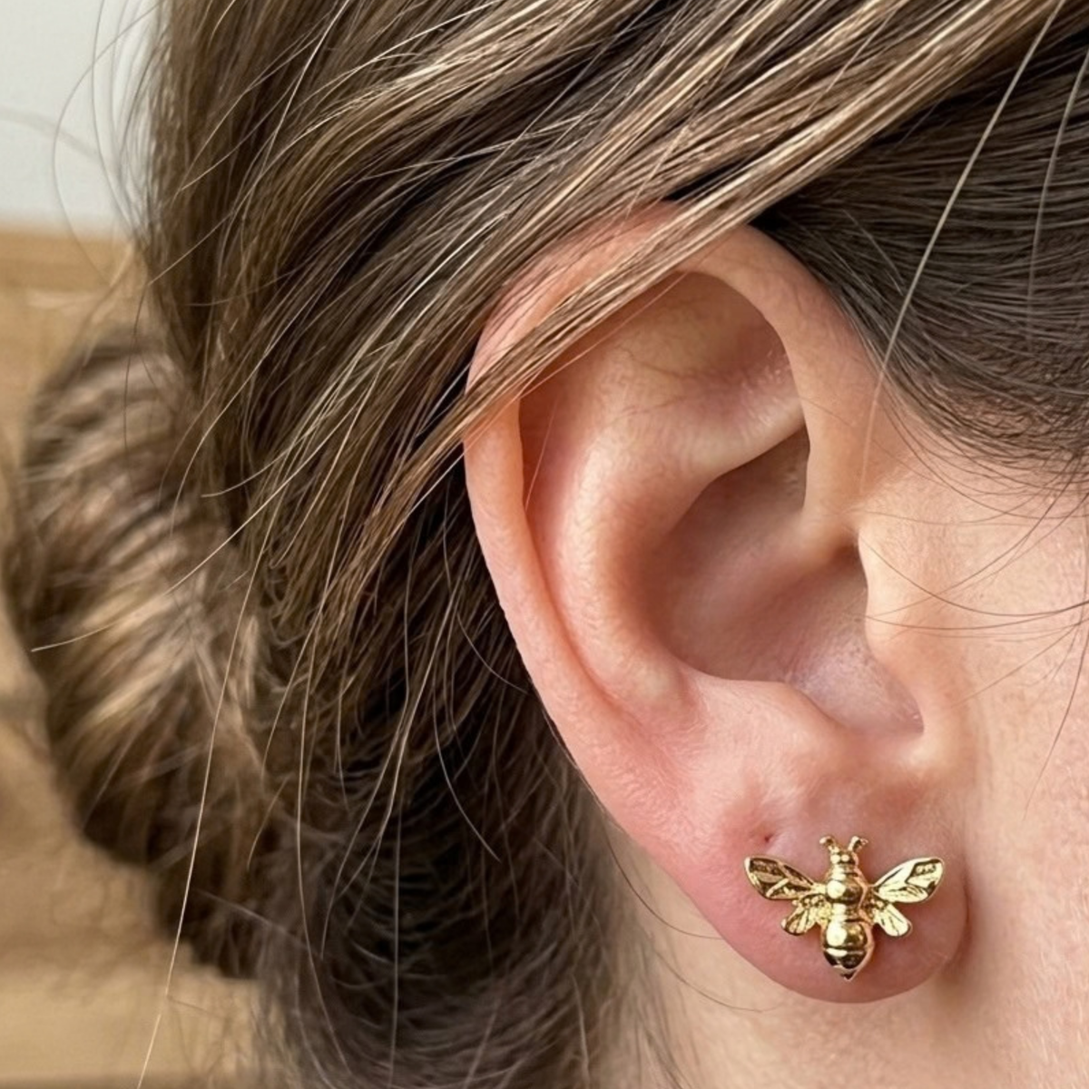 Golden bee stud earrings