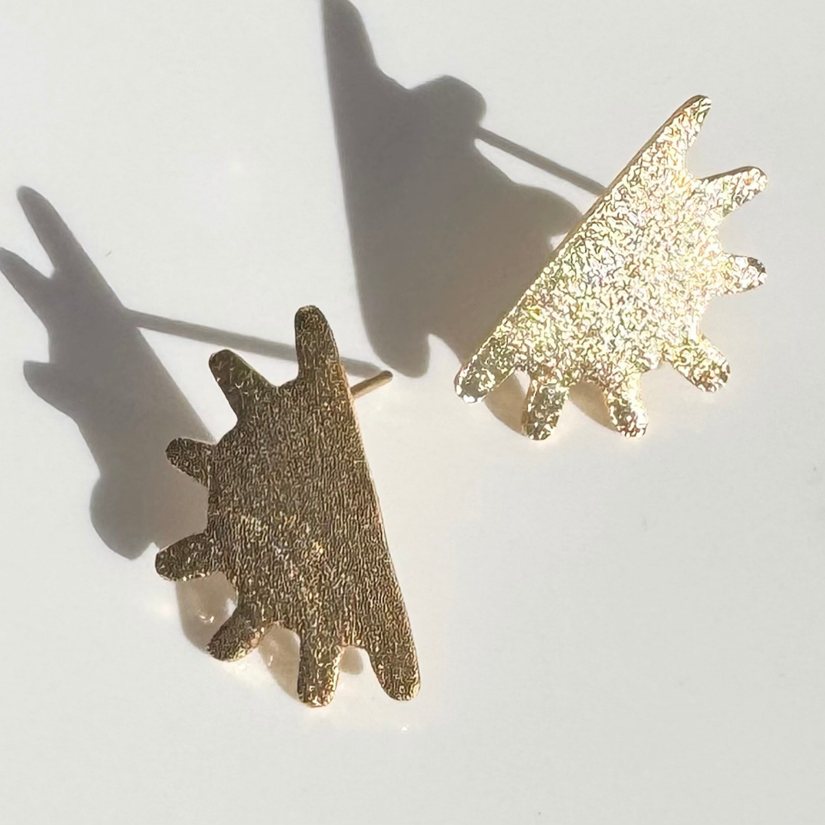 Golden sun brushed stud earrings
