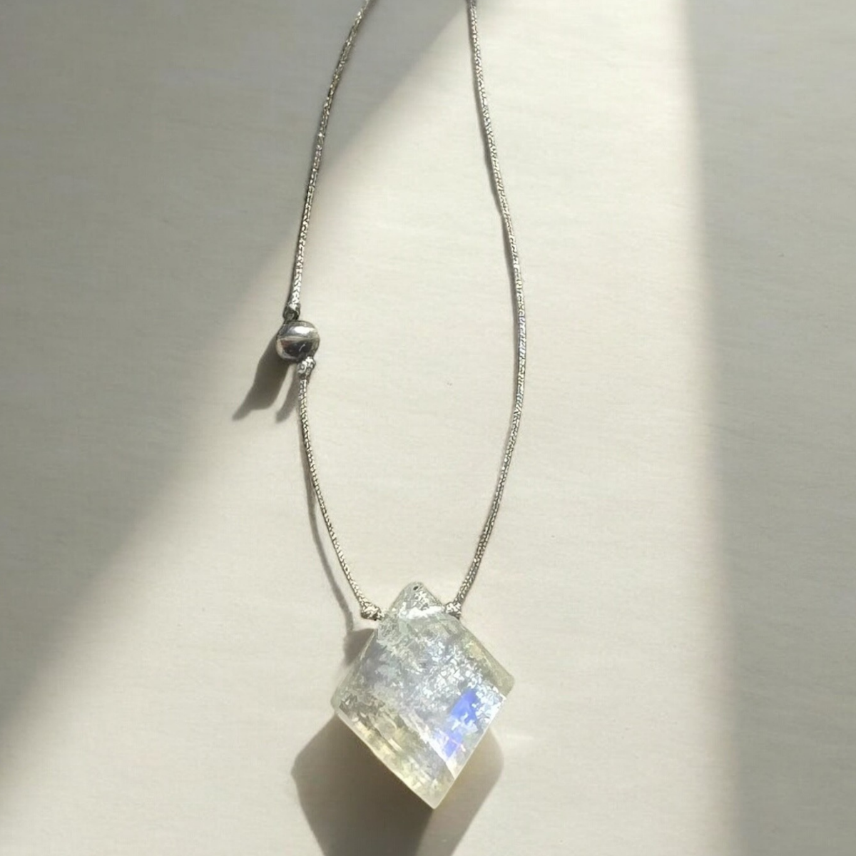 Moonstone diamond with navajo pearl