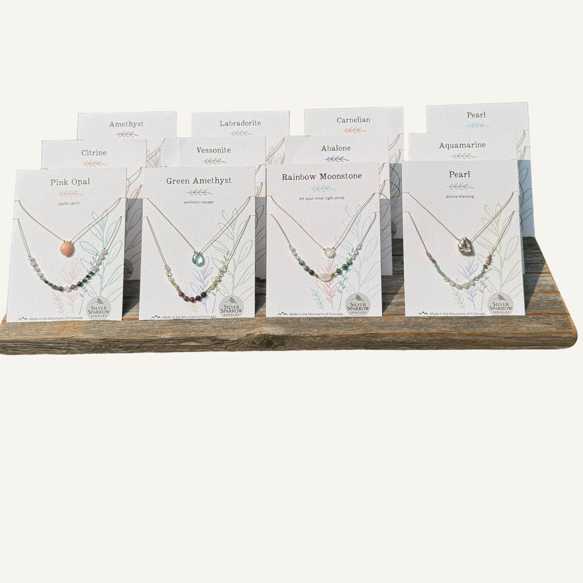 Double layer necklaces with barnboard display