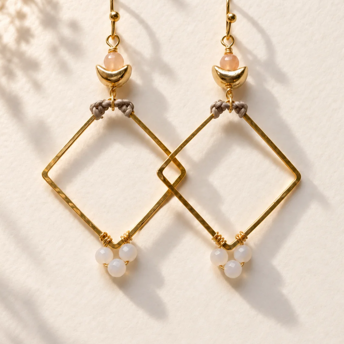 Gold diamond earrings with blue lace agate with sunstone