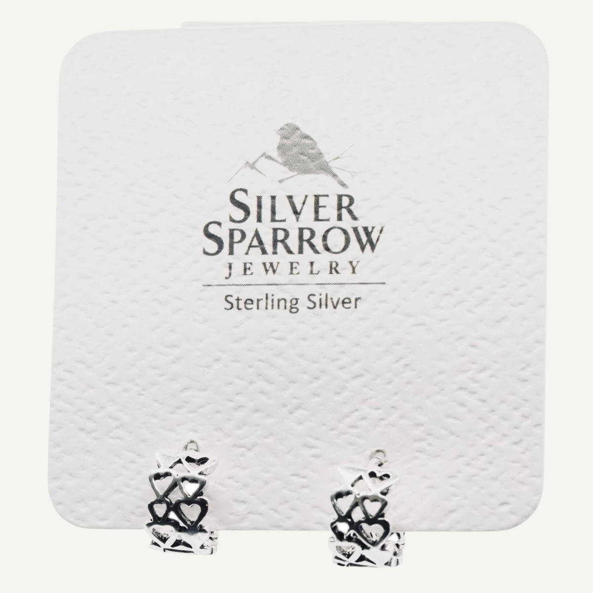 Sterling silver heart huggie earring
